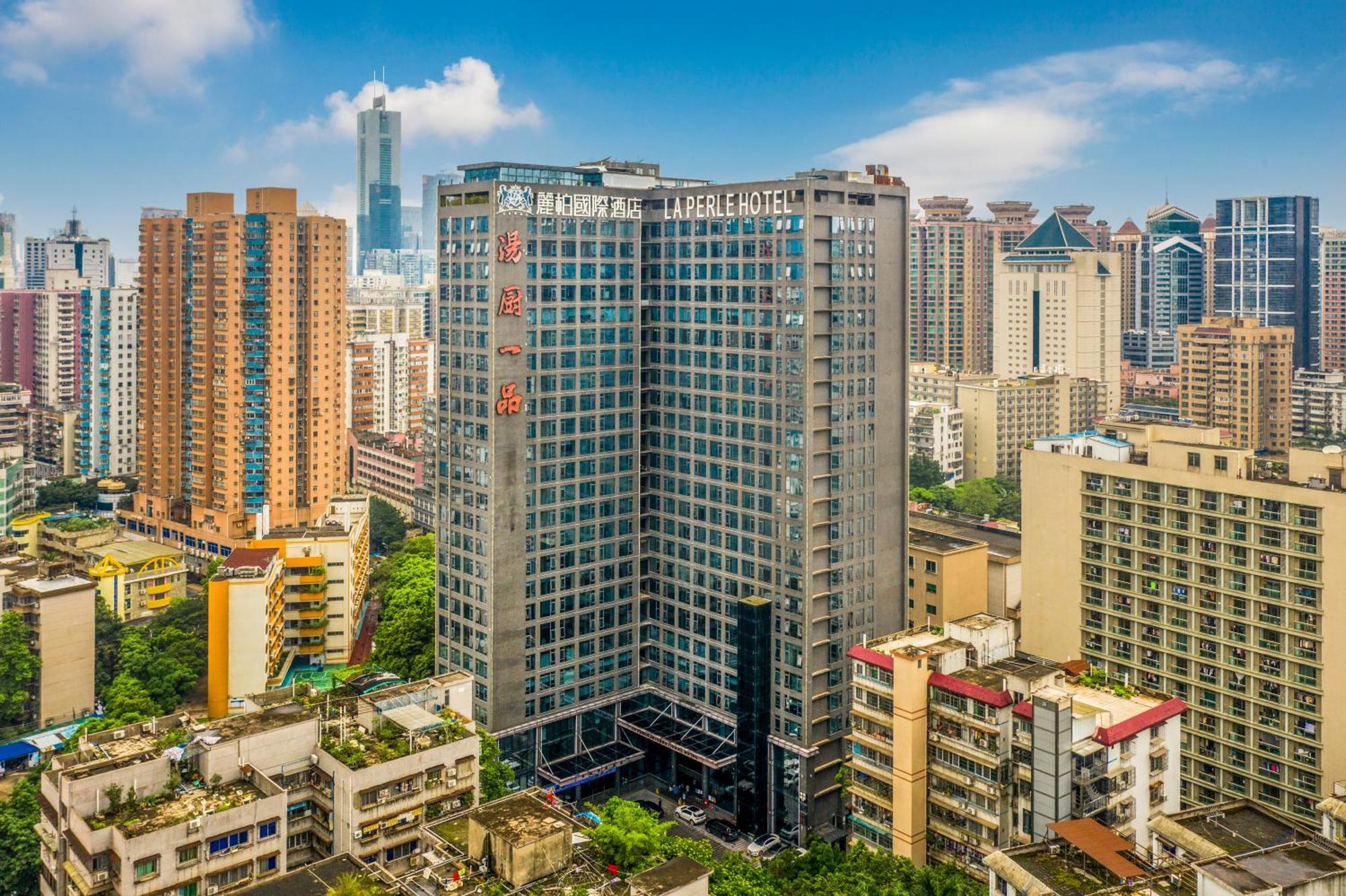 La Perle International Hotel - Free Shuttle Between Hotel And Exhibition Center During Canton Fair & Exhibitor Registration Counter מראה חיצוני תמונה