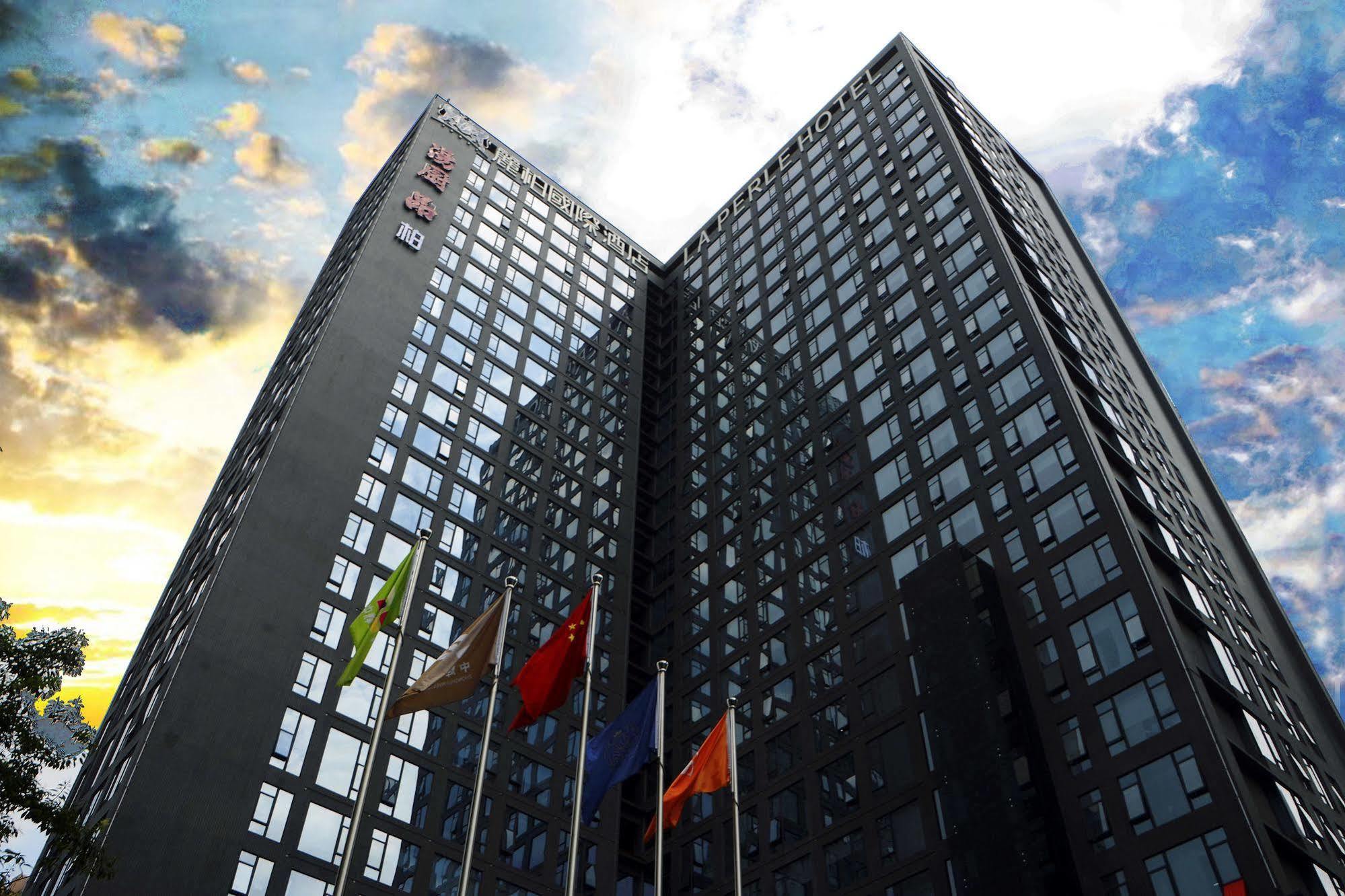 La Perle International Hotel - Free Shuttle Between Hotel And Exhibition Center During Canton Fair & Exhibitor Registration Counter מראה חיצוני תמונה